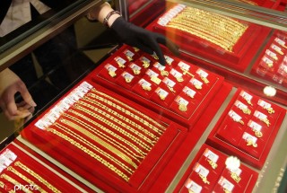 黄金定投和积存哪个收益更高？